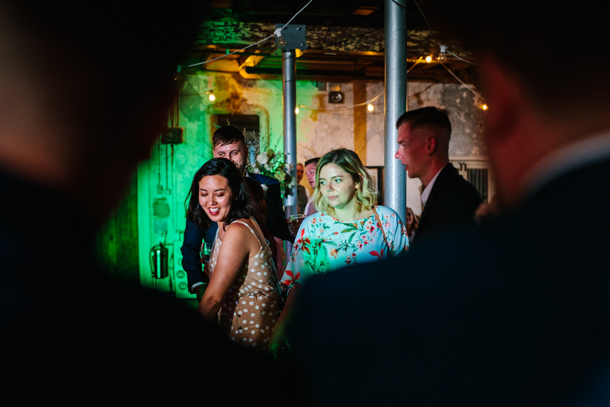 Holmes Mill wedding guests dancing 