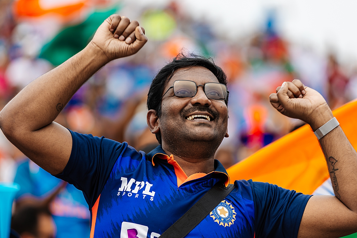 Indian fan celebrating crowd spectating Emirates Old Trafford Cricket ground 