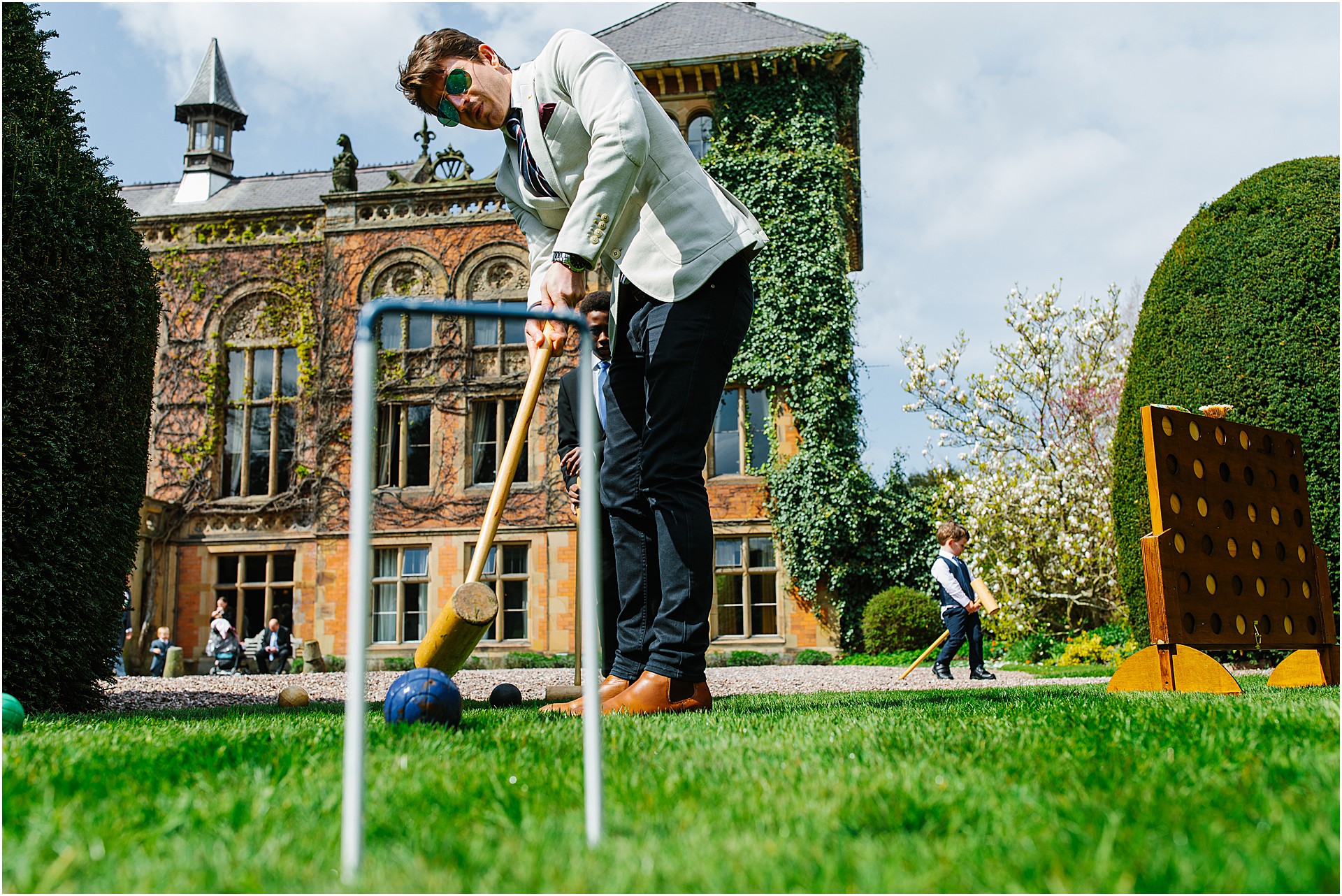 Soughton Hall Cheshire Wedding guests garden games