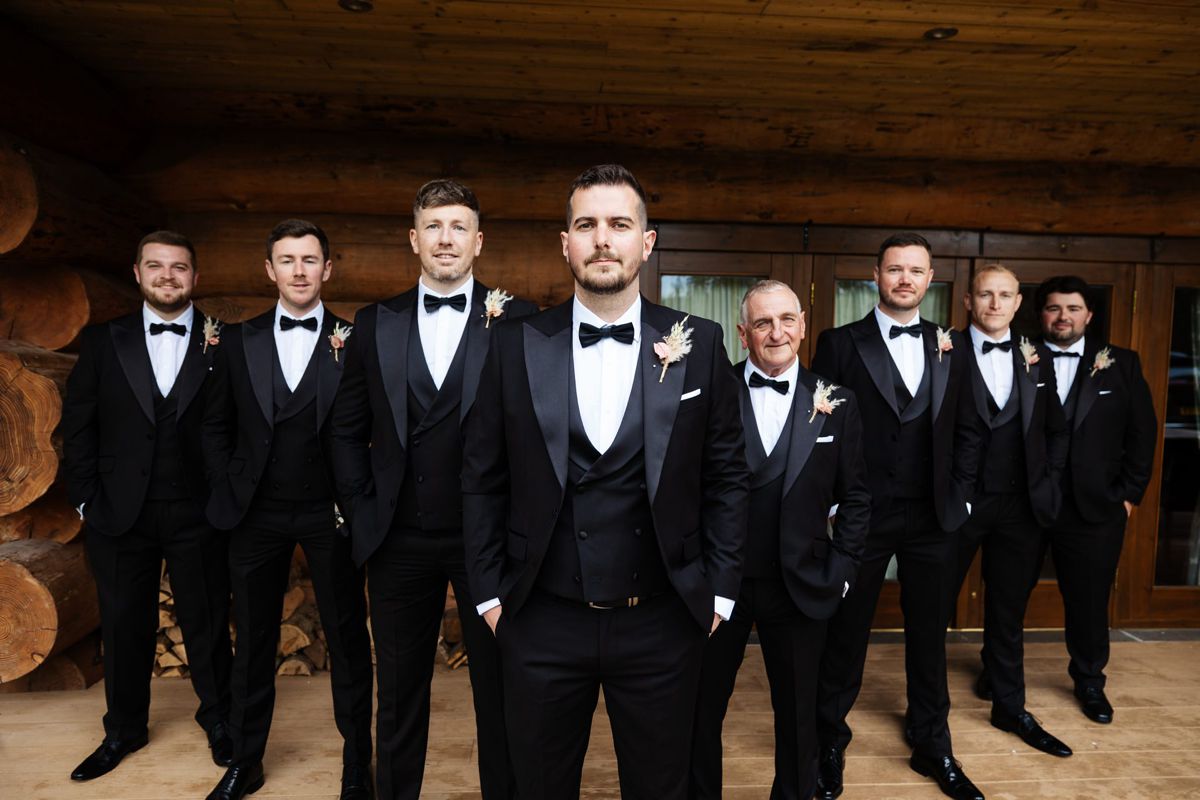 batsmen groom portrait hidden river barn wedding venue