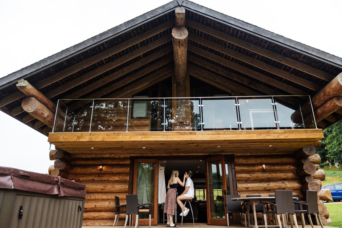 bride getting makeup hidden river barn wedding venue