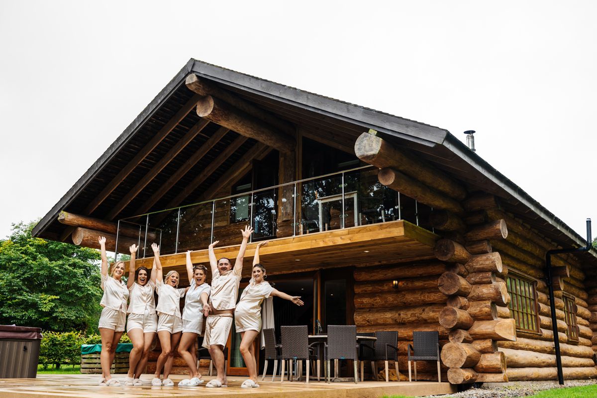 bride and bridesmaids portrait hidden river barn