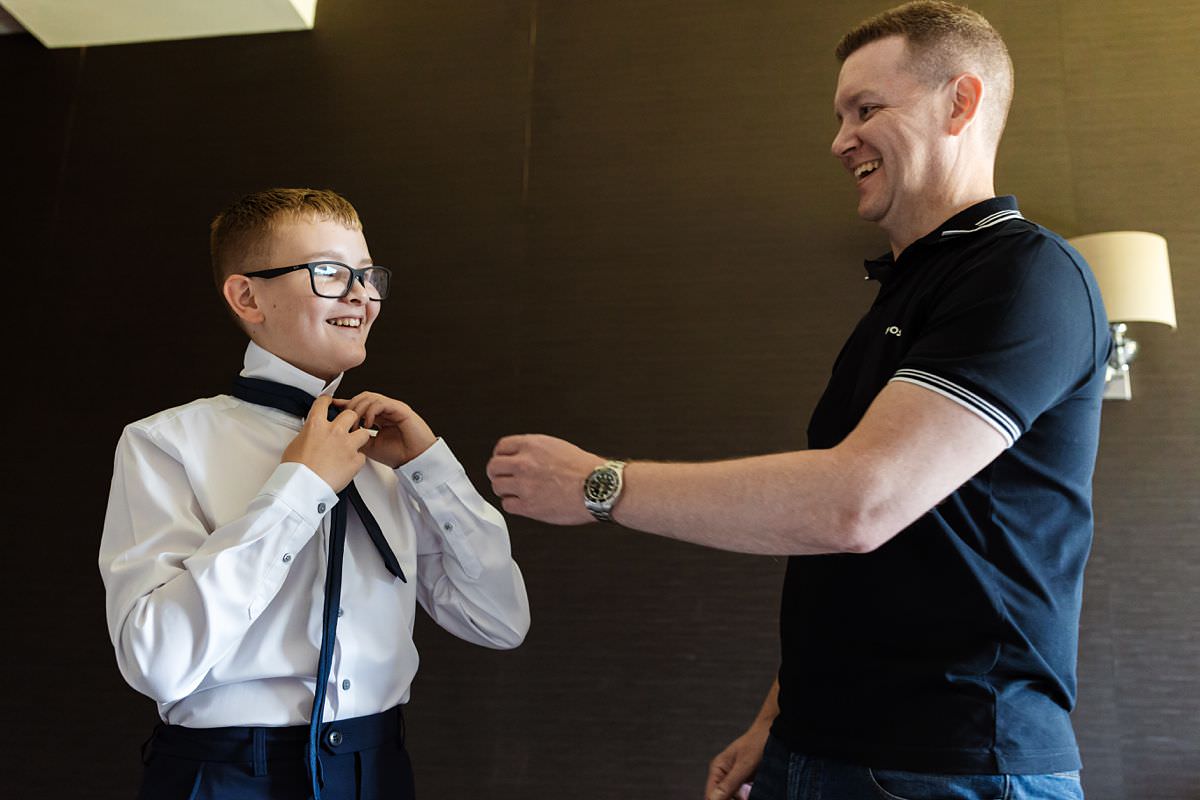 Groom and son getting ready at Stanley House Wedding Photography Venue 