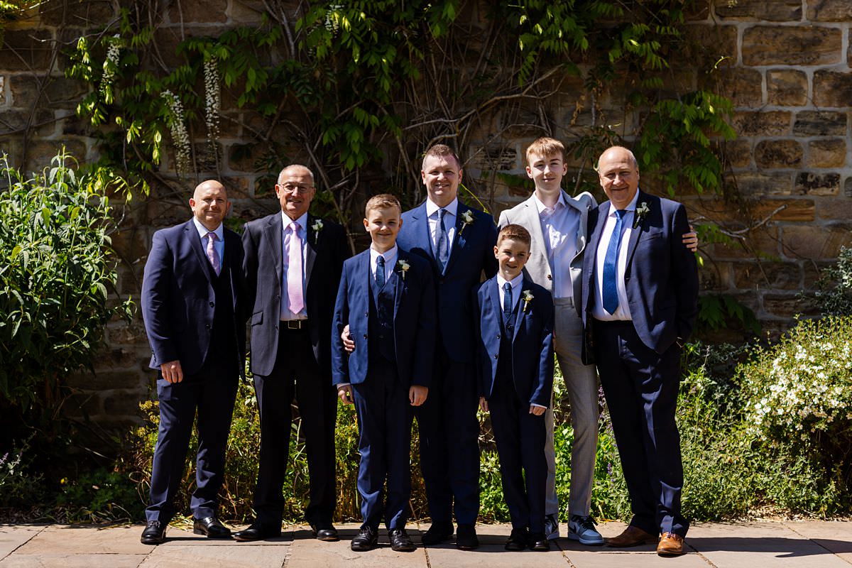 Groom with sons and family at Stanley House Wedding Photography Venue 