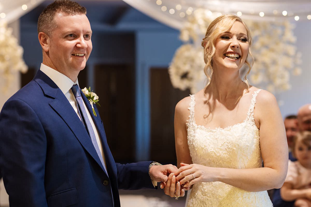 Couple laughing in the ceremony at Stanley House Wedding Photography Venue 