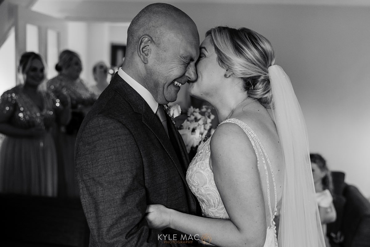 Farther of the bride seeing daughter for the first time wedding