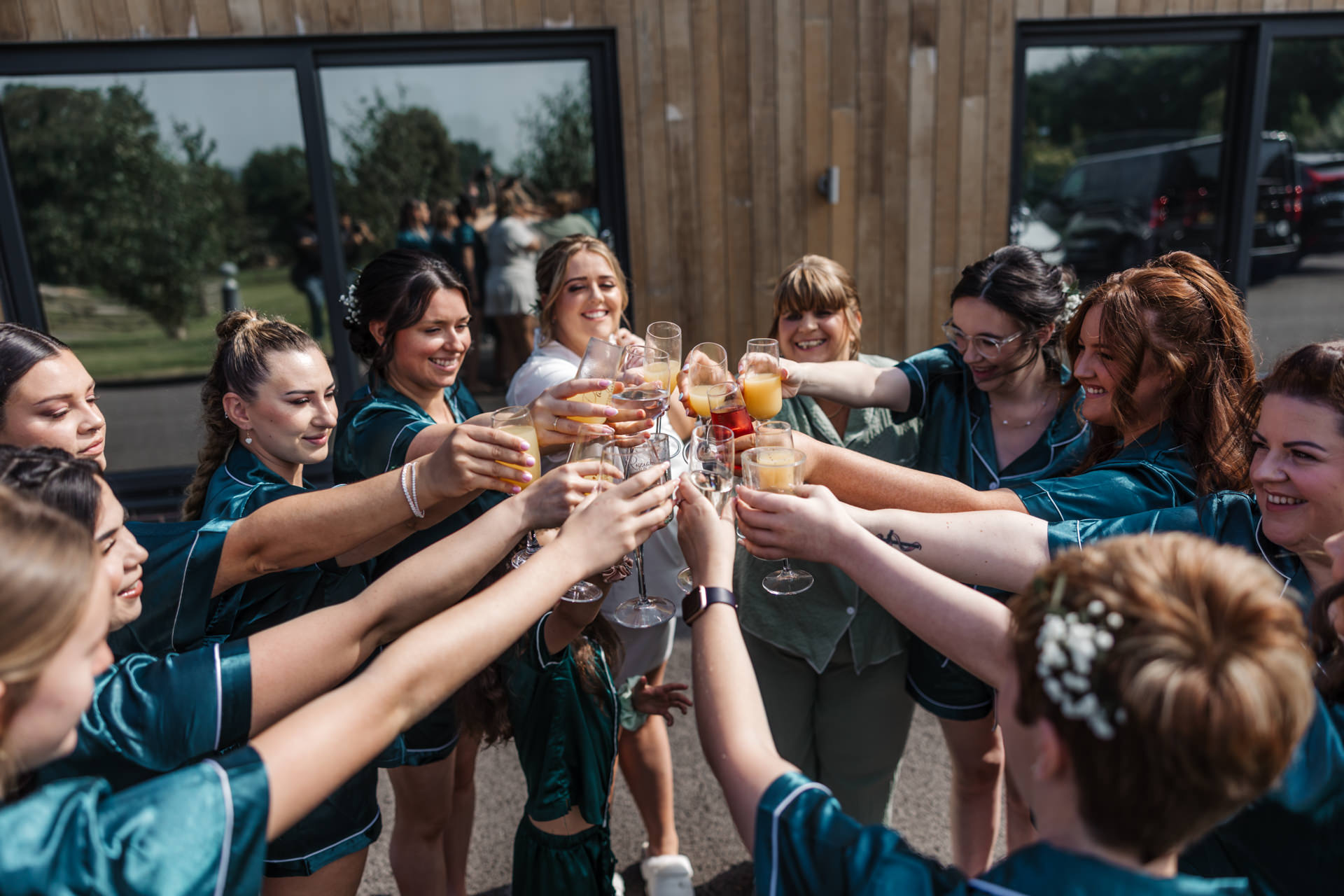 bridesmaid's cheering to celebrate the wedding at west view