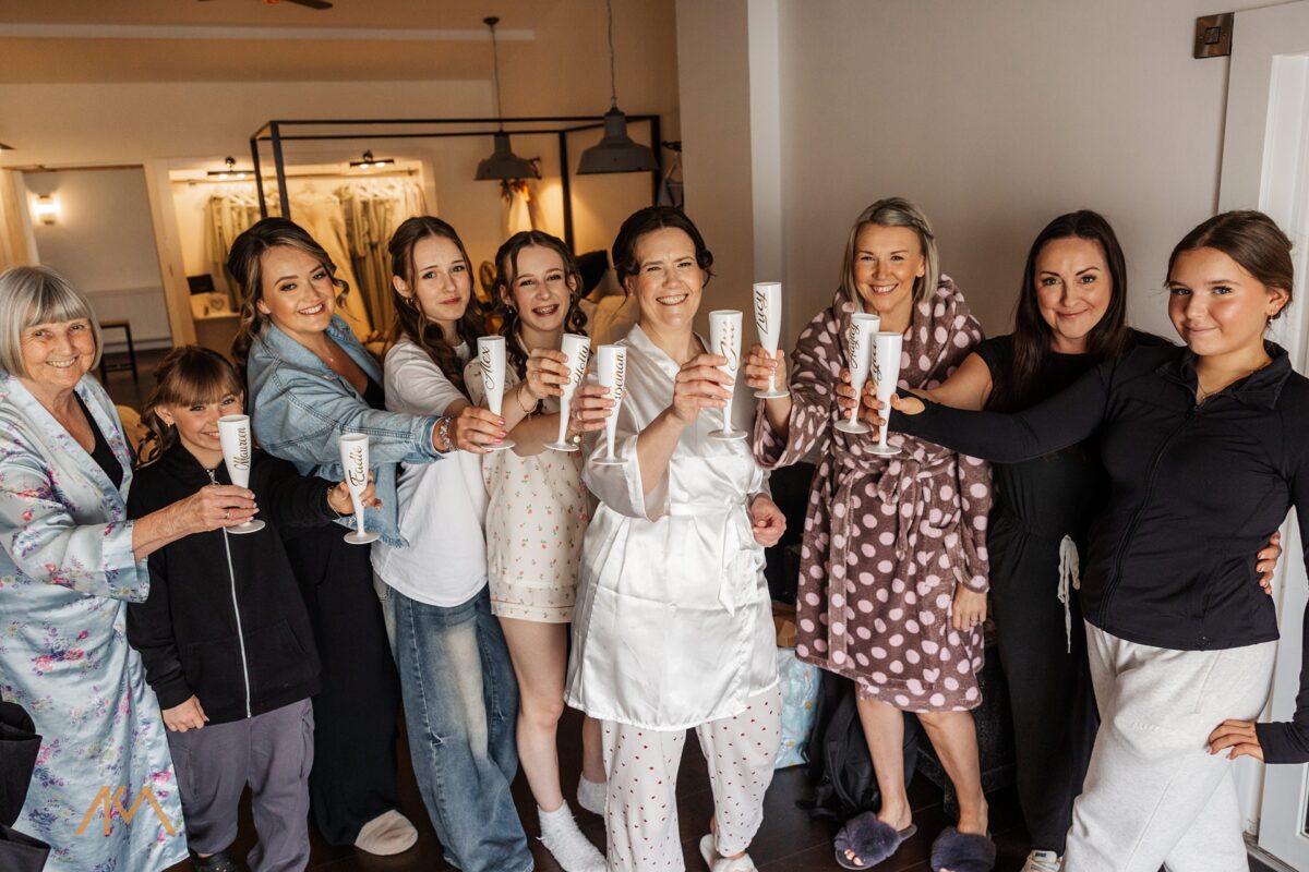 bride bridesmaids drinks bashall barn wedding venue