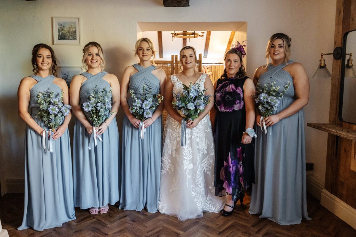 brides maids flowers wedding family river barn